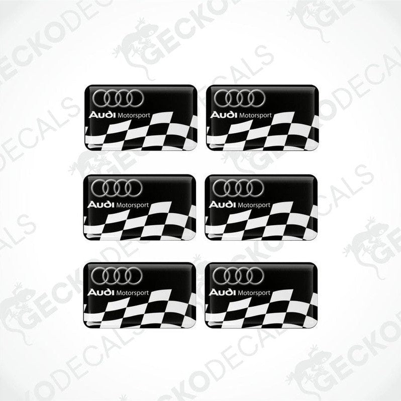 Set of six black and white checkered decals with the Audi Motorsport logo.