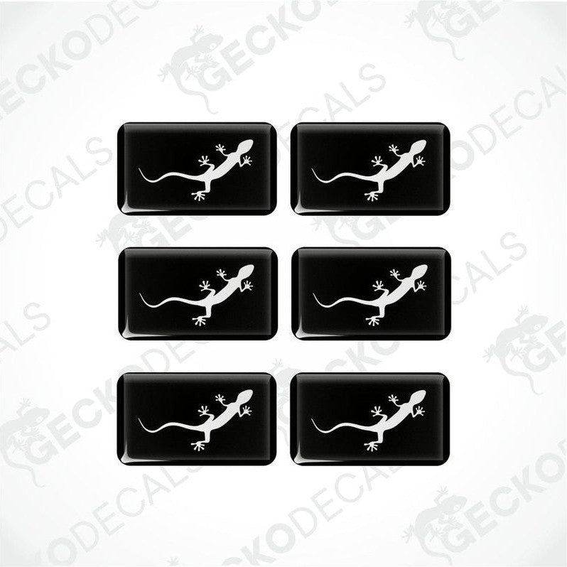 A set of six black vinyl stickers with a white outline of a car, specifically an Audi Quattro.