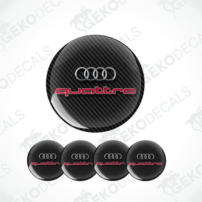 Carbon fiber pattern Audi logo with 'quattro' text on a white background