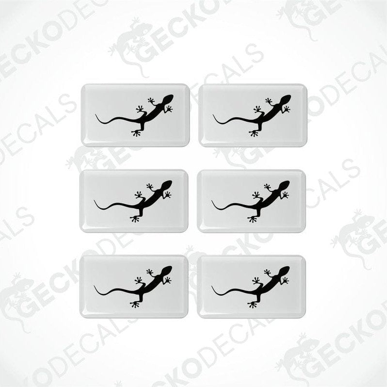 A set of six white vinyl stickers with a black outline of a car, specifically an Audi Quattro.
