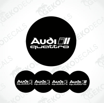 Inside the black circle is the Audi lettering in white, with 3 squares behind it, inside the first square are the Audi rings, below it is the word quattro, the background is white with GeckoDeckals watermarks