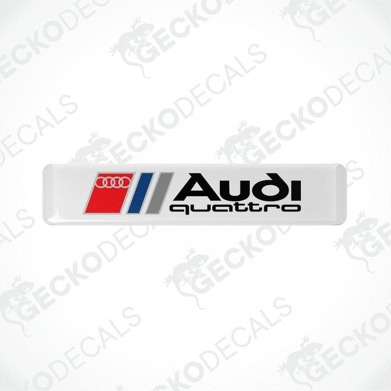 Audi Quattro branded vinyl decals with a white background and red and silver accents.