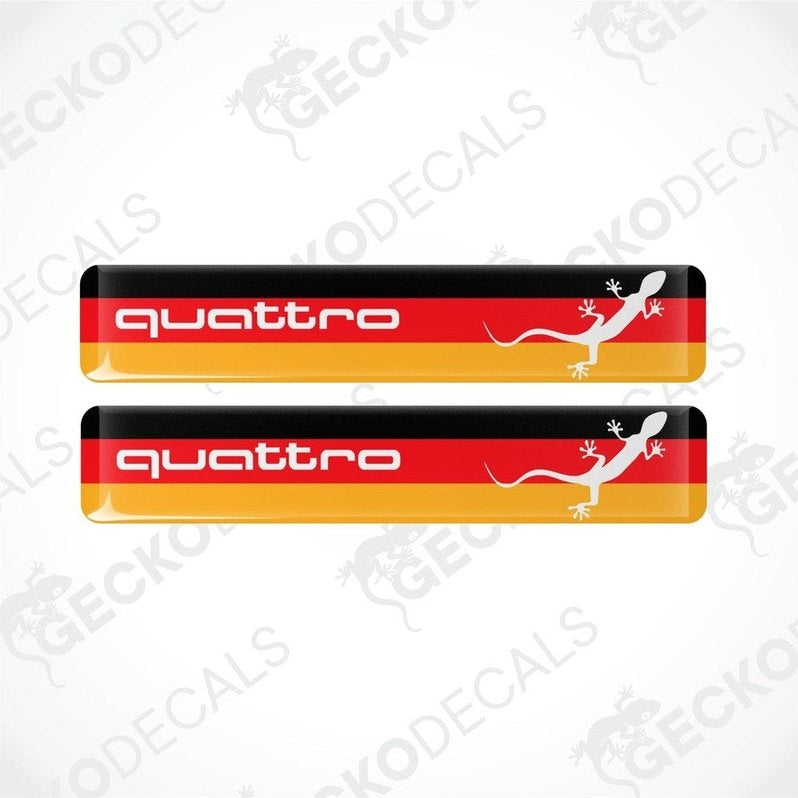 Two Audi Quattro stickers, in the colors of the German flag.