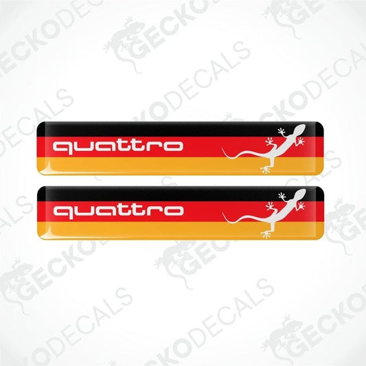 Two Audi Quattro stickers, in the colors of the German flag.