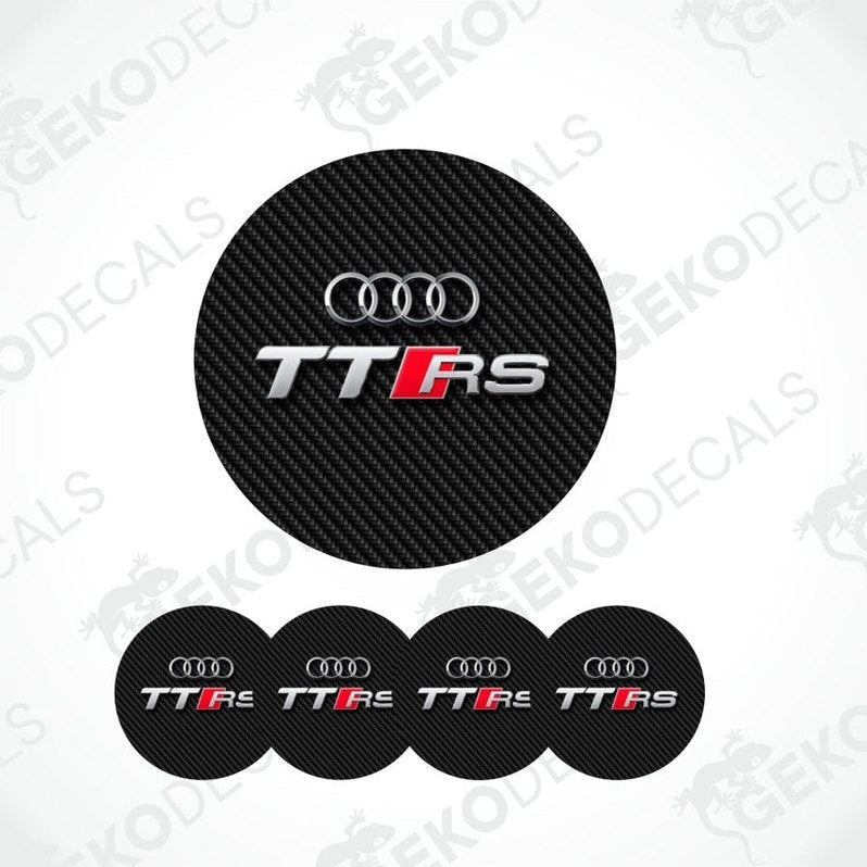 Black and yellow 'e-tron' logo with multiple instances on a white background.
