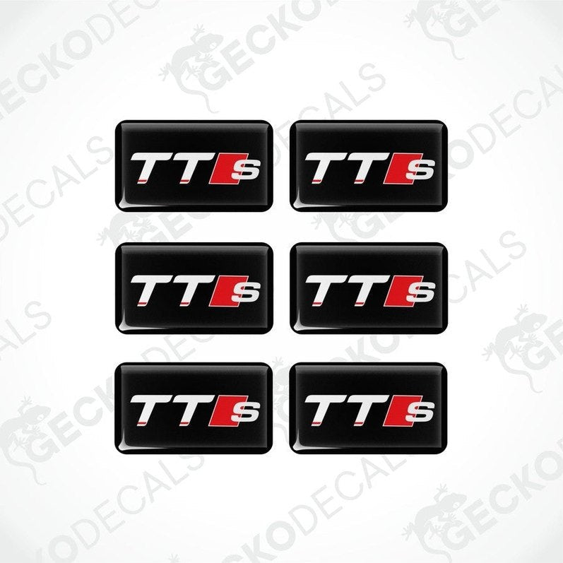 A set of six black, red, and white vinyl decals with the 'TT S' logo.