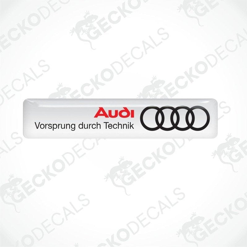 White vinyl decals with the Audi logo and the phrase 'Vorsprung durch Technik' in white lettering.