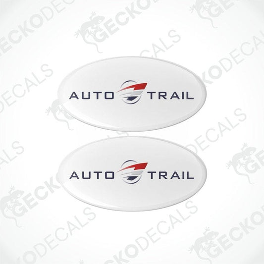 Two white epoxy decals with the text 'AUTO-TRAIL' and a graphic of an arrow and the GeckoDecals logo.