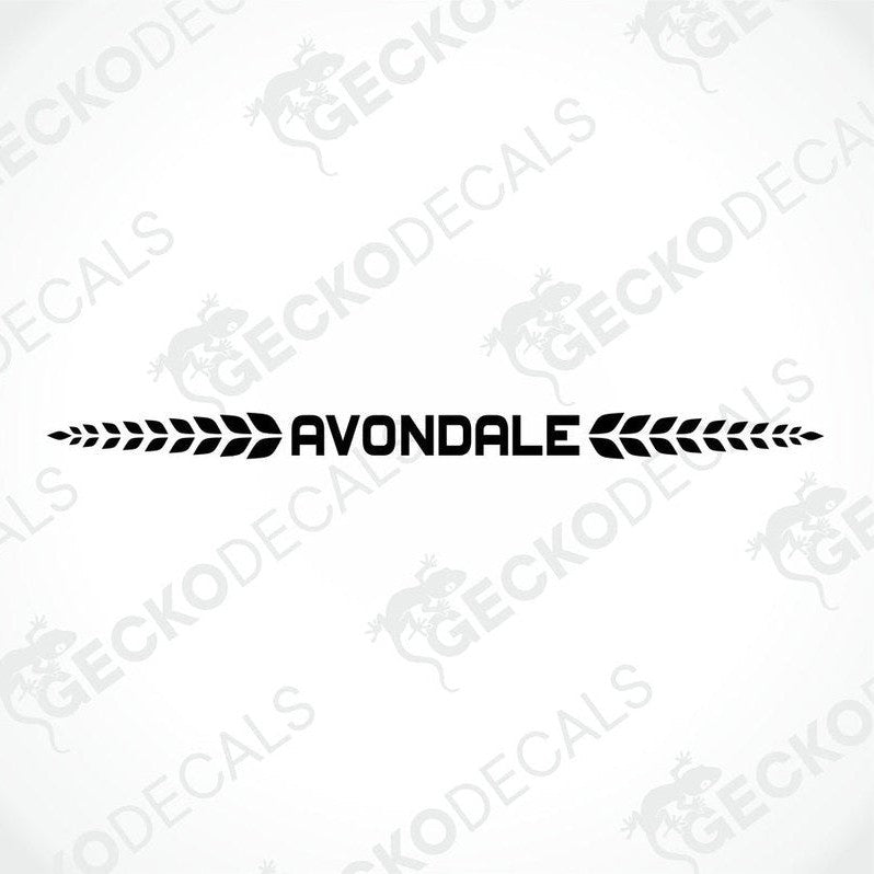 Black Avondale die-cut sticker with symmetrical leafy wreath motifs on transfer paper