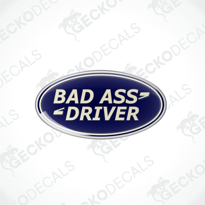 Blue oval-shaped vinyl decals with the text 'BAD ASS DRIVER' in white and silver.

