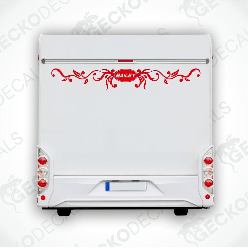 Red ornate scrollwork BAILEY caravan rear decal on white exterior