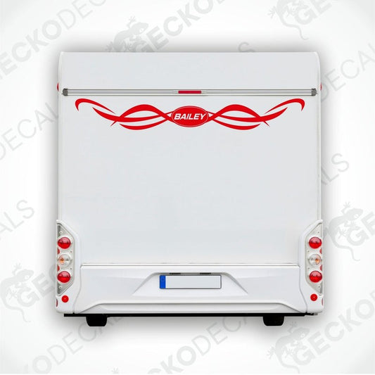 Red BAILEY caravan rear decal applied to white caravan exterior panel