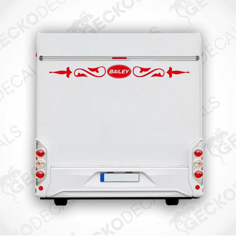 Red BAILEY caravan rear decal applied to white caravan exterior above bumper