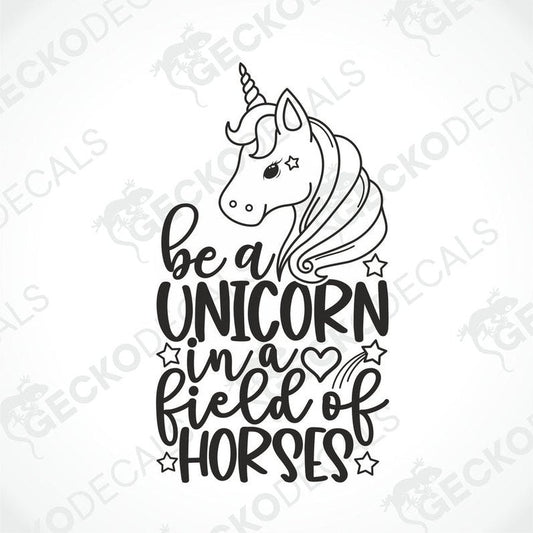 Black die-cut unicorn decal with 'be a UNICORN in a field of HORSES' text and heart stars