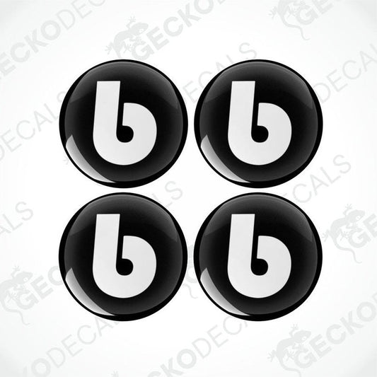 A set of four black and white vinyl decals with the letter 'b' on them, designed for use on vehicles.