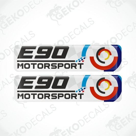 Two 'E90 Motorsport' decal stickers with a circular design on a white background.