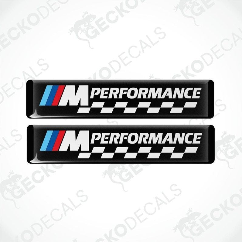Two rectangular vinyl decals with a polyurethane coating featuring the BMW M Performance logo in black, white, red, and blue colors.