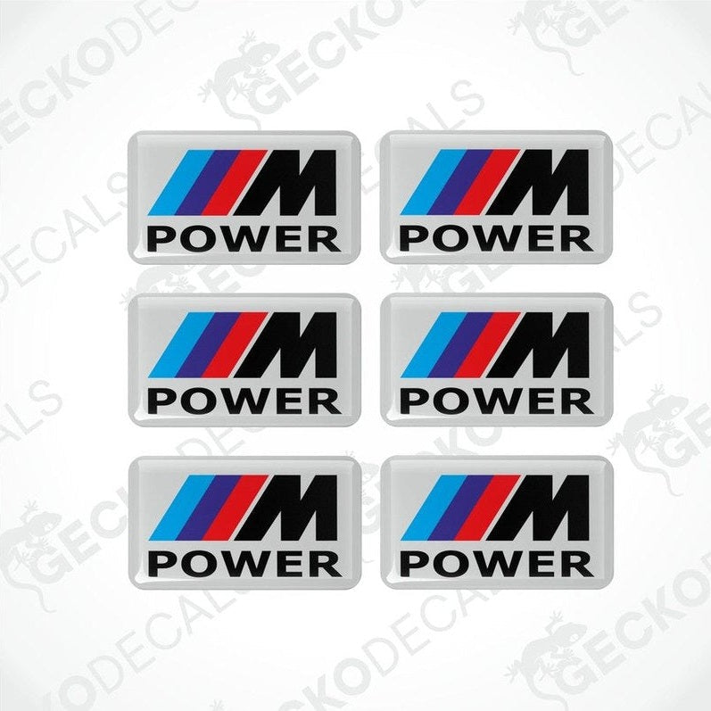 A set of six BMW M POWER vinyl decals with a polyurethane coating, displayed against a white background.