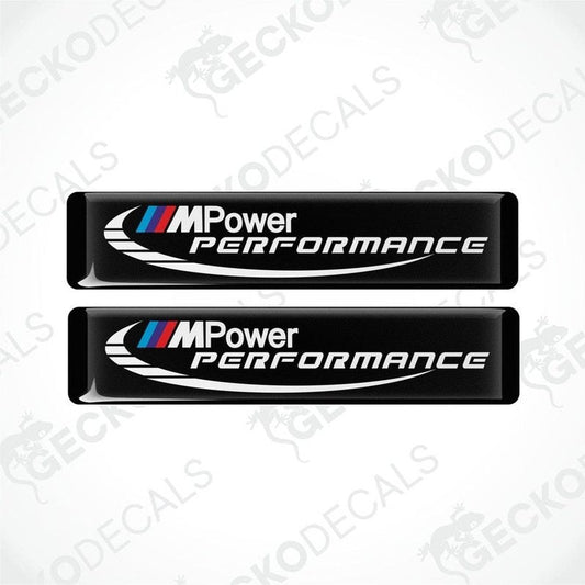 Two black decals with 'M Power Performance' text and the BMW logo in white and blue