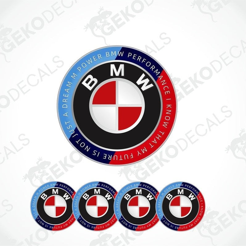 A set of round BMW M POWER PERFORMANCE vinyl decals with a red, white, and blue color scheme and the BMW logo prominently displayed.
