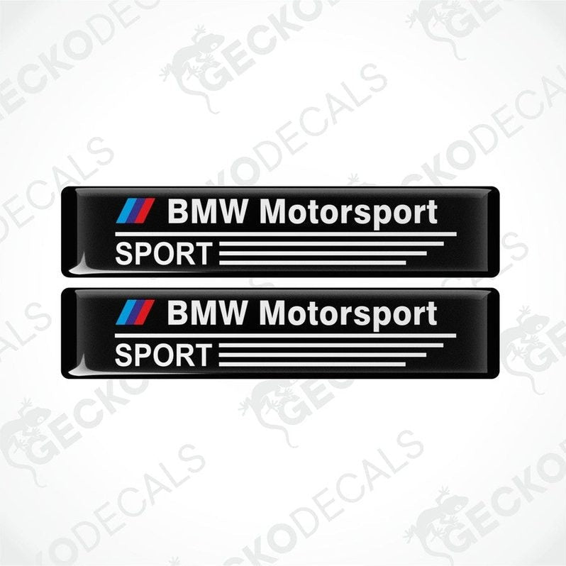 Set of four vinyl decals with a polyurethane coating featuring the BMW Motorsport logo in black, red, and white colors.