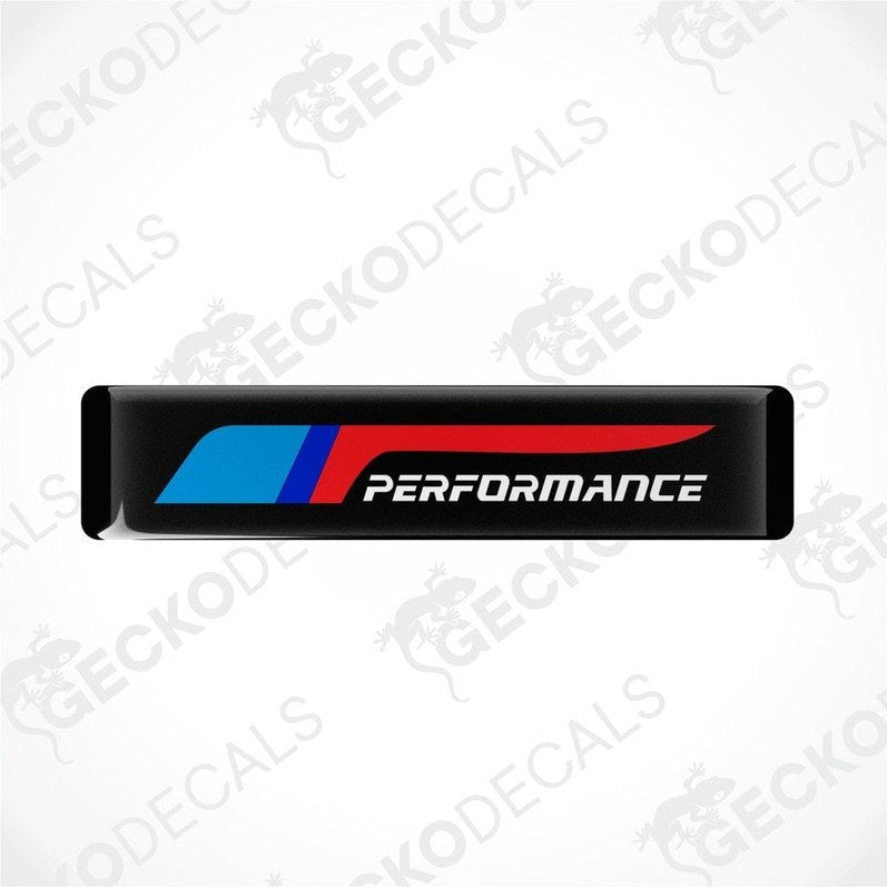 Black vinyl stickers with red and blue geometric patterns and the text 'PERFORMANCE' on a white background.