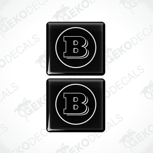 Two black vinyl stickers with a white 'B' in the center, placed against a white background with the text 'GeckoDecals'.