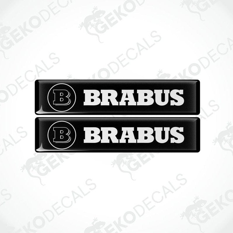Two black and white rectangular BRABUS vinyl decals with a polyurethane coating.