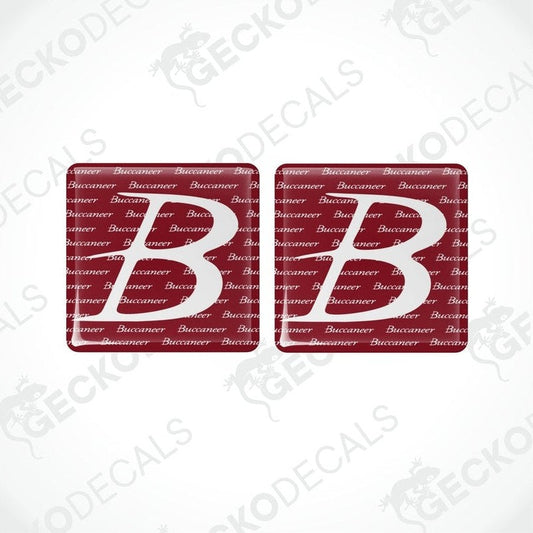 Two square red and white vinyl decals with the word 'Buccaneer' and the letter 'B' on them.