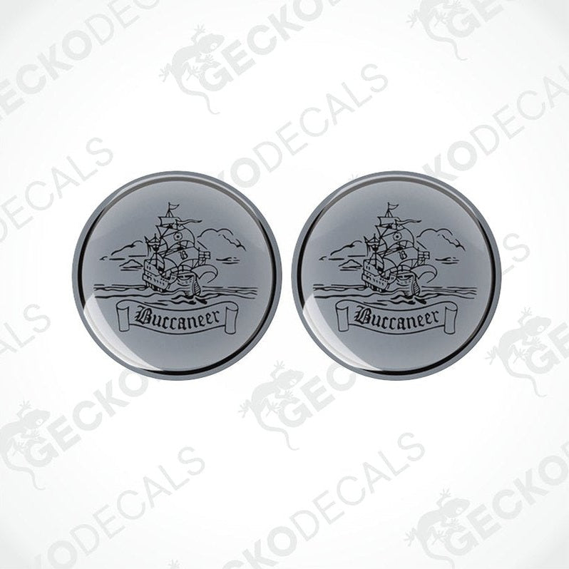 Two round black and white vinyl decals with the word 'Buccaneer' and an illustration of a ship.