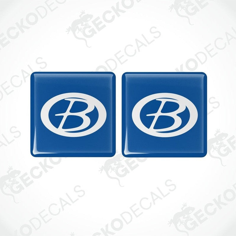 Two blue vinyl stickers with a white 'B' logo, placed against a white background with the text 'GECKODECALS'.