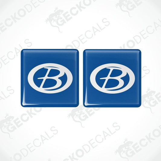 Two blue vinyl stickers with a white 'B' logo, placed against a white background with the text 'GECKODECALS'.