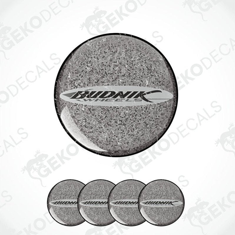 A set of vinyl decals with 'BUDNIK' branding and a speckled grey appearance, including four circular decals of varying sizes.