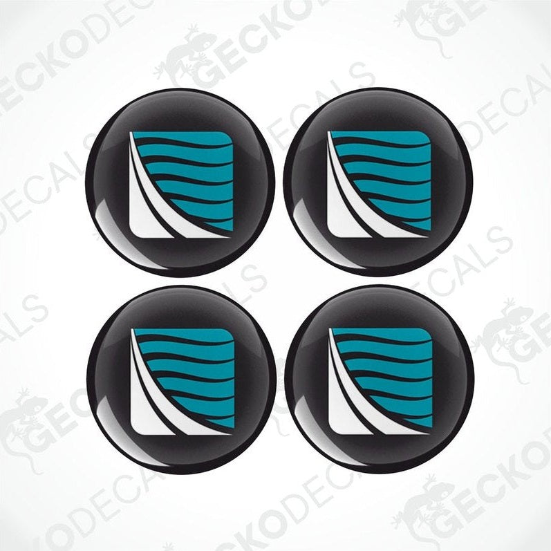 A set of four round black vinyl decals with a blue and white geometric pattern, designed for use on caravans.