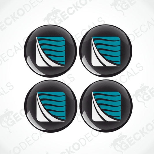 A set of four round black vinyl decals with a blue and white geometric pattern, designed for use on caravans.