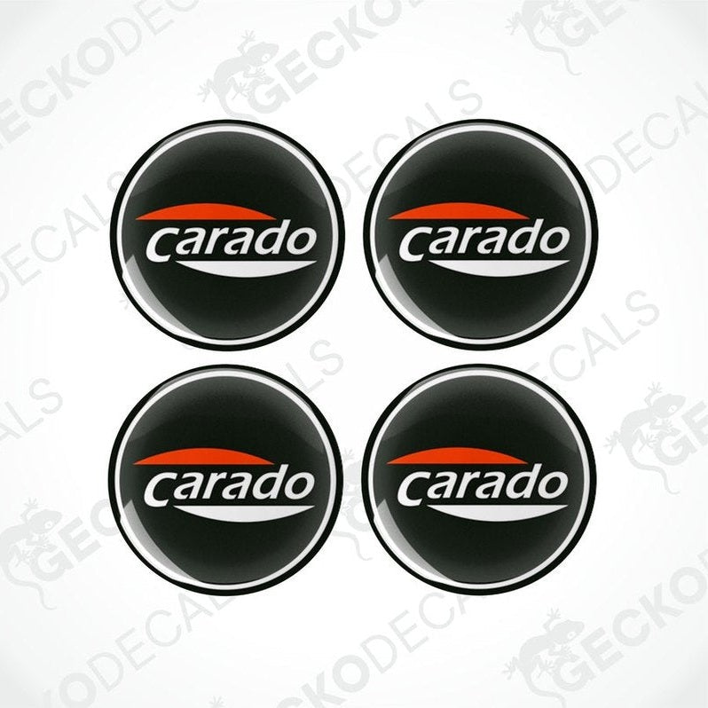 A set of four round black, red, and white Carado branded epoxy decals.