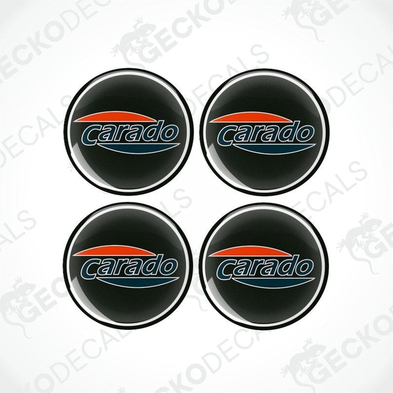 A set of four round black vinyl decals with the 'carado' brand name and red and orange accents.