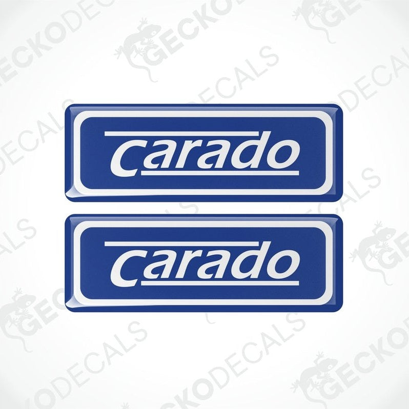 Two blue vinyl stickers with the word 'CARADO' printed in white.