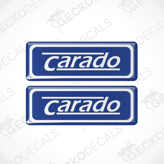 Two blue vinyl stickers with the word 'CARADO' printed in white.