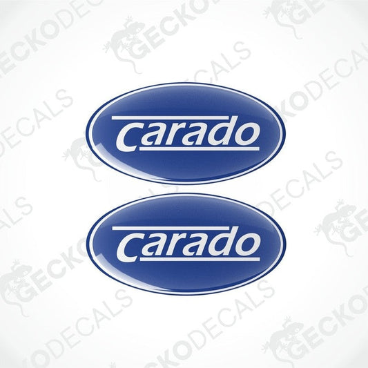 Two blue vinyl stickers with the word 'CARADO' printed on them.