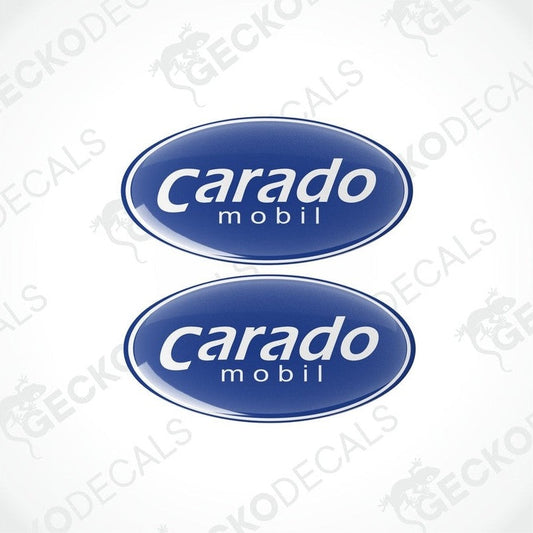 Two blue vinyl stickers with the word 'CARADO' printed on them.