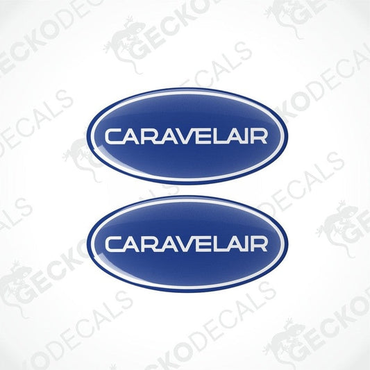 Two blue oval-shaped vinyl decals with the text 'CARAVELAIR' in white.