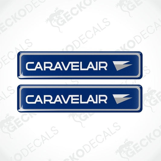 Two blue vinyl decals with the word 'CARAVELAIR' written in white and a red arrow symbol.