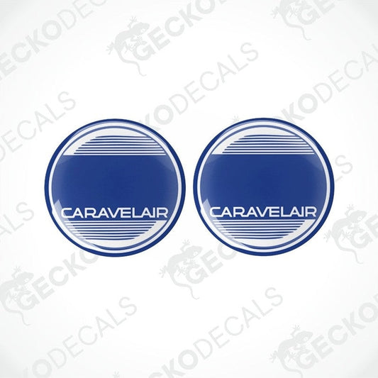 Two round blue vinyl decals with the text 'CARAVELAIR' on them, placed on a white background.