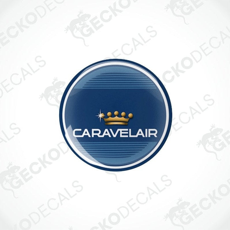 Two round blue vinyl decals with the text 'CARAVELAIR' and a crown symbol in white and gold.