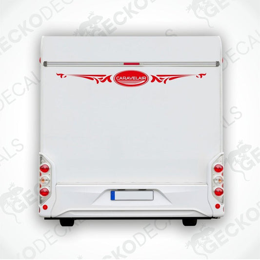 A white caravan rear with a red and white decorative decal applied on it.