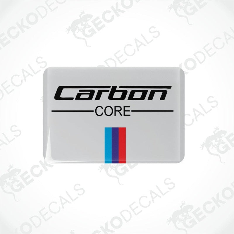 Rectangular vinyl decals with 'Carbon CORE' text and a red and blue stripe on a white background.