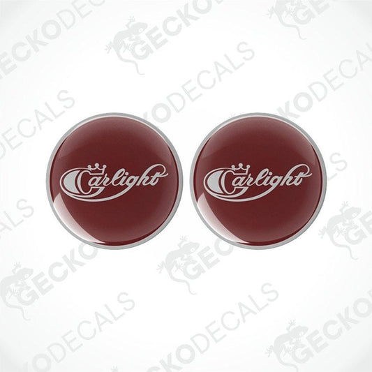 Two round brown decals with the word 'Carlight' and a logo consisting of a stylized 'C' on a white background, placed on a white background with the text 'Gecko Decals'.