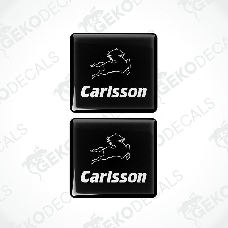 Two black rectangular car decals with the text 'Carlsson' in white.
