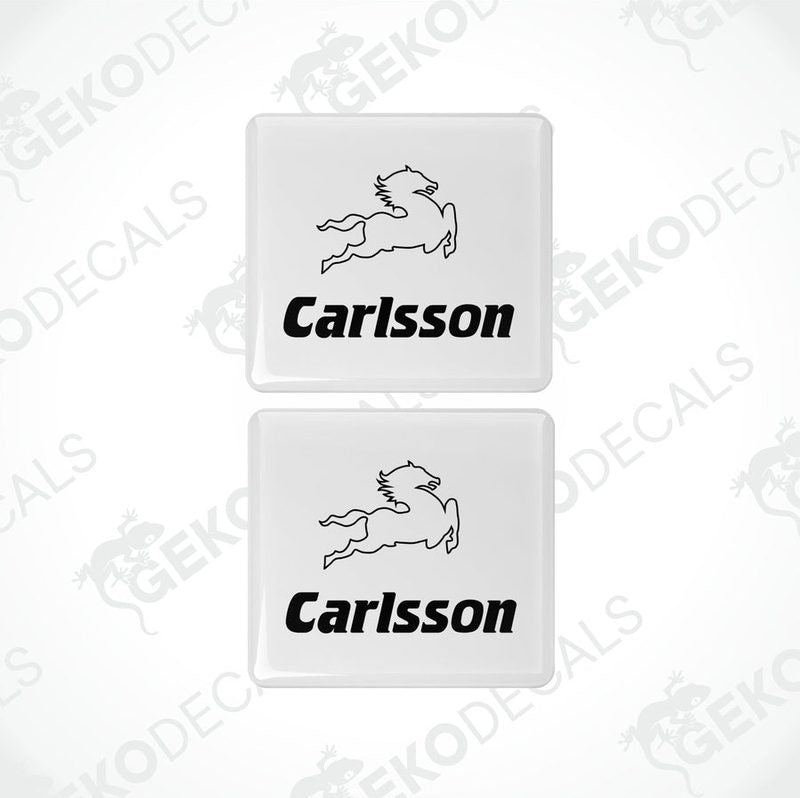 Two white rectangular car decals with the text 'Carlsson' in black.